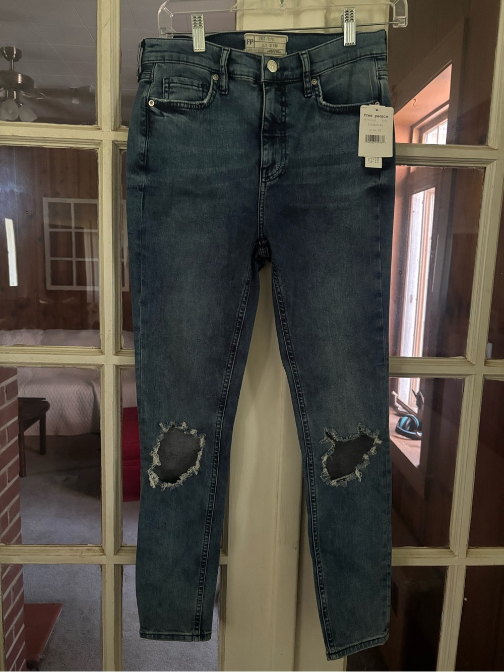 Free People Skinny Jeans in Dark Blue with Knee Rips
